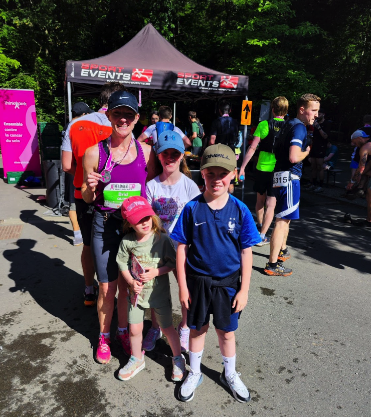 A mother and her three children running for a good cause