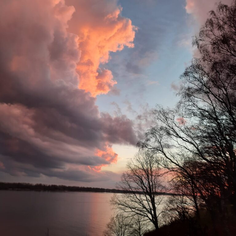 Dark smokey clouds and fresh looking sky