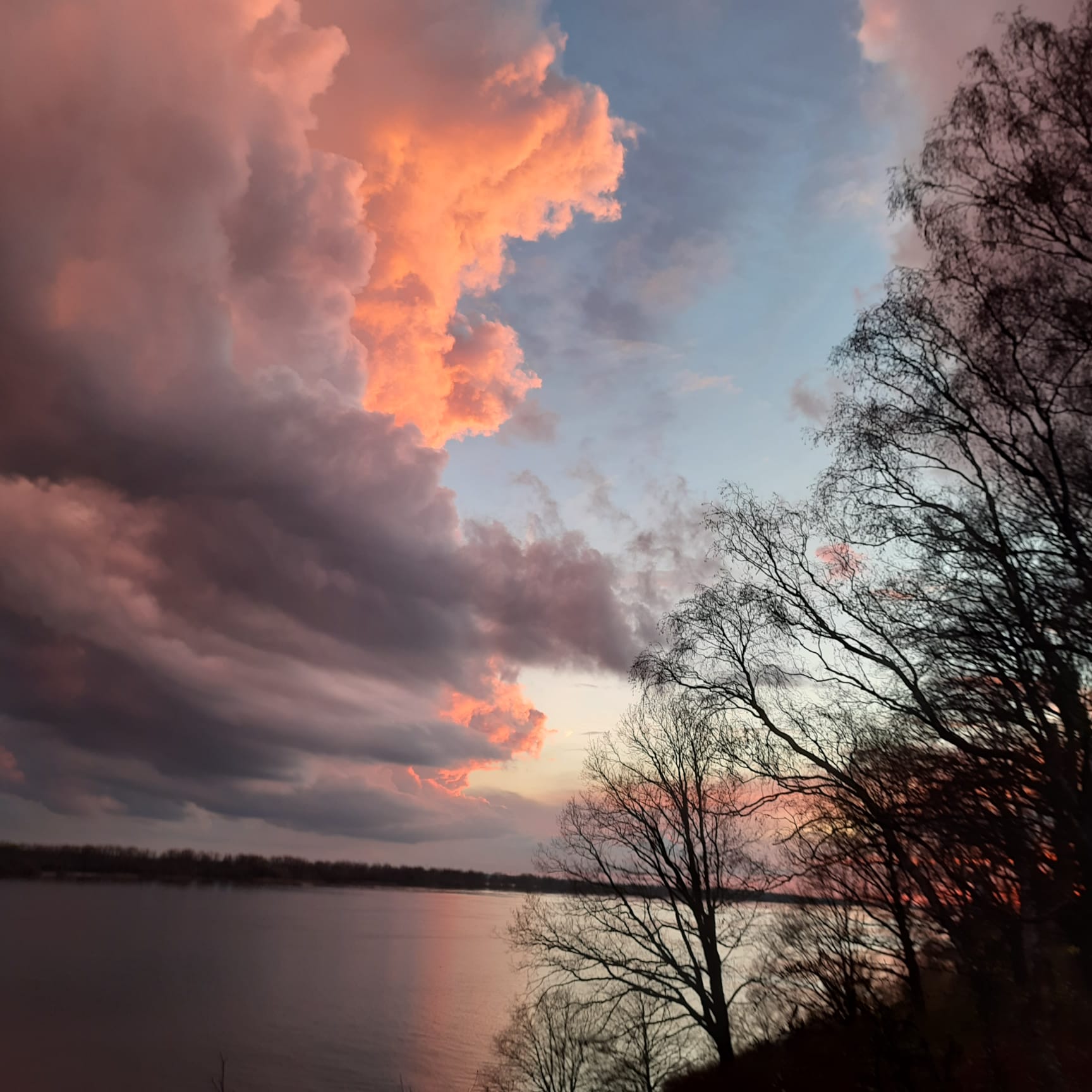 Dark smokey clouds and fresh looking sky