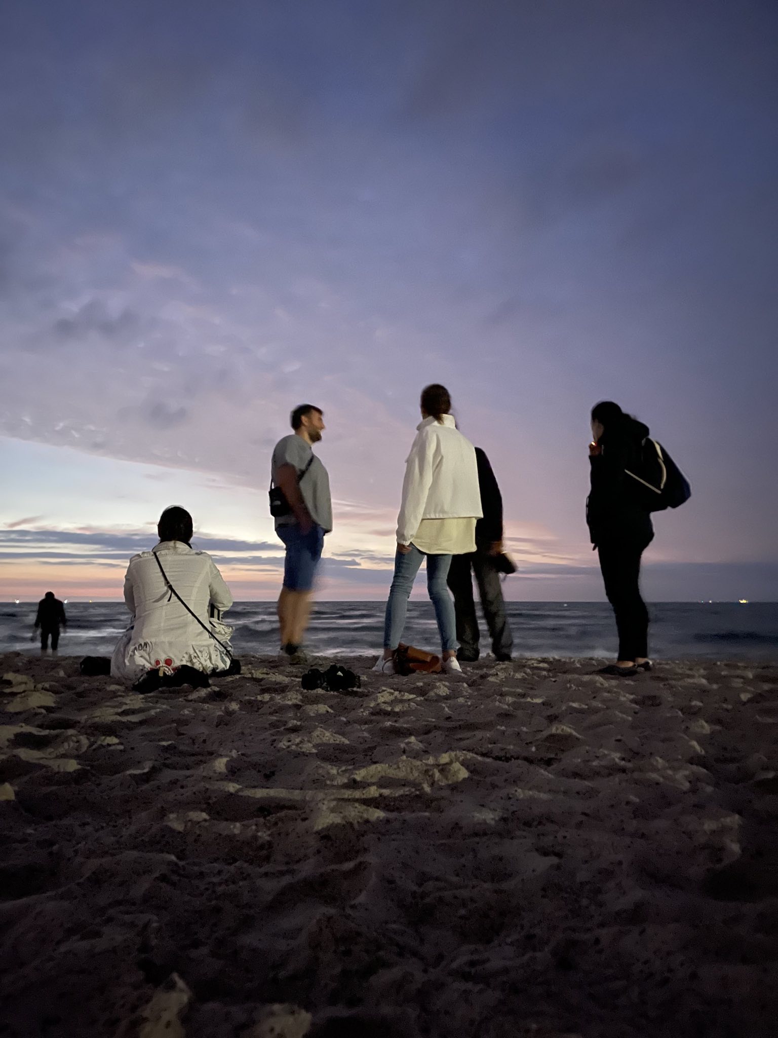 Youth at the beach at sundown