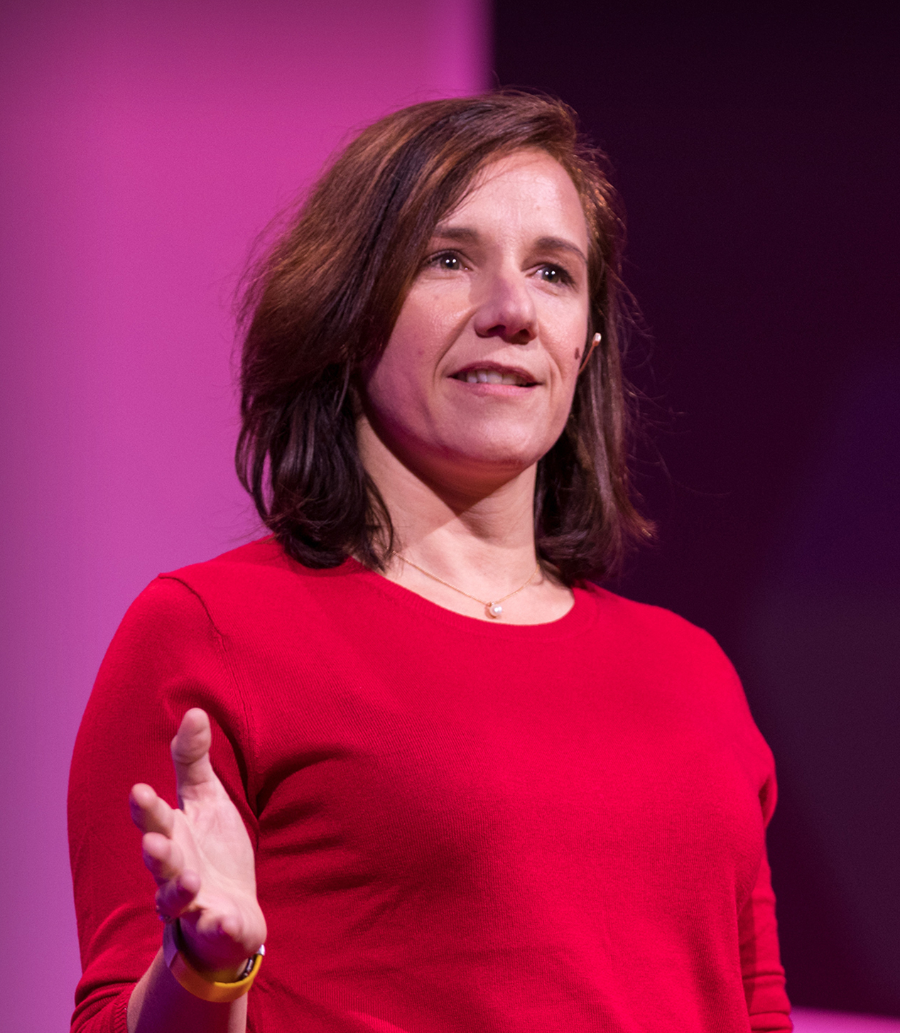 Emilie Weight on stage at TED talk