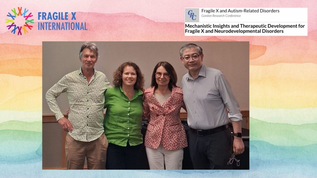Prof Frank Kooy, Dr. Kirsten Johnson. Prof Claudia Bagni and Prof Peng Jin smiling for the camera
