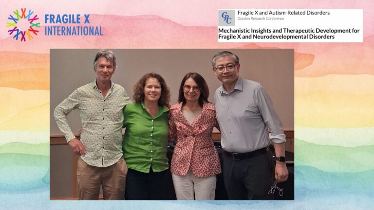 Prof Frank Kooy, Dr. Kirsten Johnson. Prof Claudia Bagni and Prof Peng Jin smiling for the camera