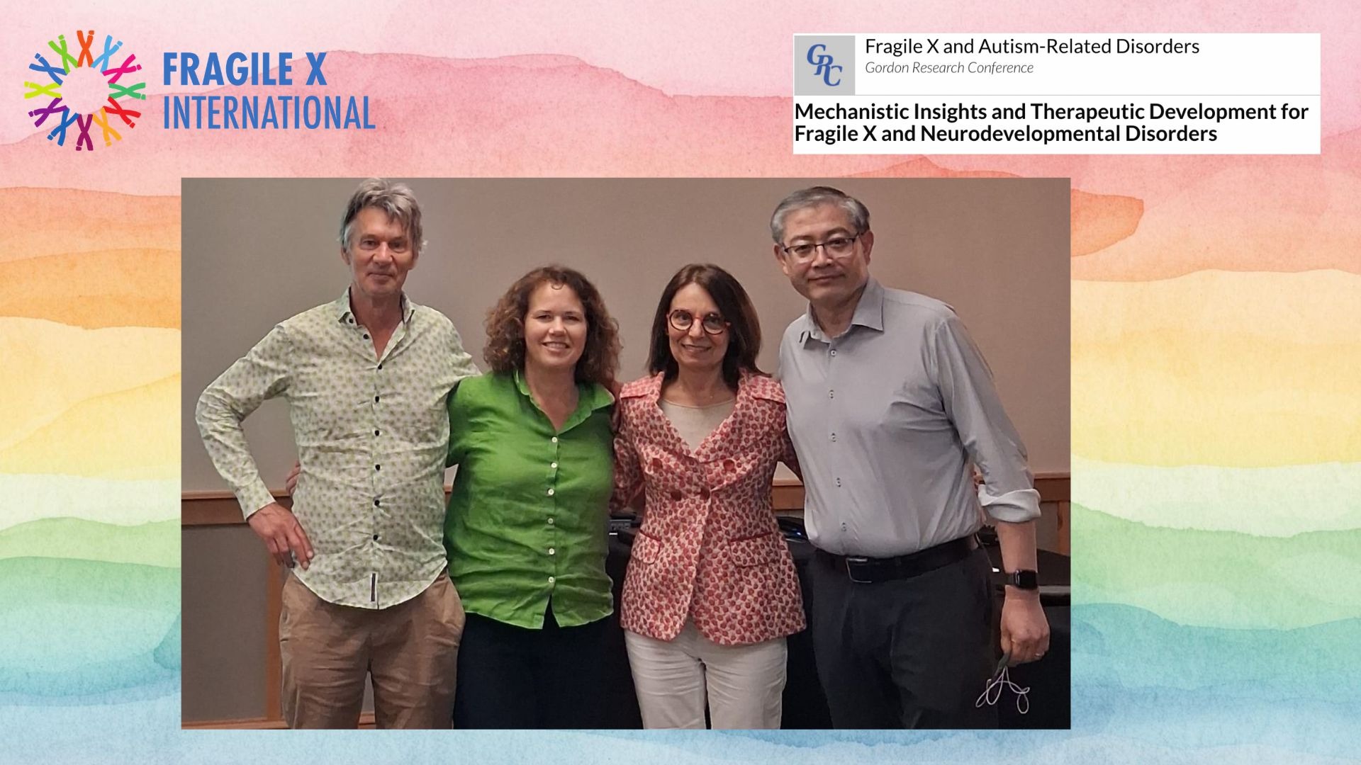 Prof Frank Kooy, Dr. Kirsten Johnson. Prof Claudia Bagni and Prof Peng Jin smiling for the camera